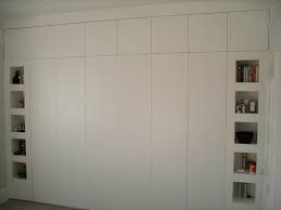 Approx 234cm height x 60cm depth x 60cm width (per wardrobe). Wall To Wall Wardrobe By Peter Henderson Furniture Brighton Uk Floor To Ceiling Wardrobes Built In Wardrobe Wardrobe Doors
