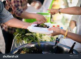 The Concept Of Social Sharing Poor People Receiving Food From Donations Homeless People Are Helped With Food Relief Poor People Photo Editing Stock Photos