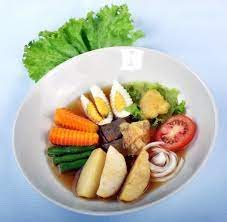 Potongan iga sapi yang dibakar dan disajikan dengan potongan wortel, buncis, ubi ungu. Selat Solo Es Krim Rm Kusuma Sari Solo Kabarkuliner Com