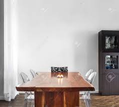 A contemporary dining room needs minimal. Modern And Contemporary Dining Room Table And Decorations With Stock Photo Picture And Royalty Free Image Image 26492592