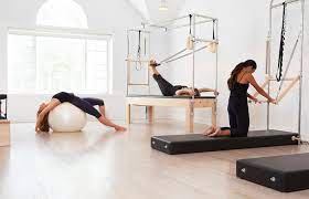 Hamptons yoga studio open to its terrace overlooking nature and a canal. Guide To The Hamptons Fitness And Yoga Studios Well Good