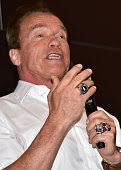 The rings of Arnold Schwarzenegger are seen as he speaks to guests at...  News Photo