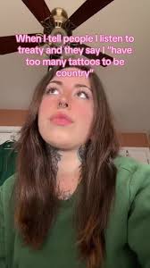 Zach Bryan Bull Skull Tricep Tattoo