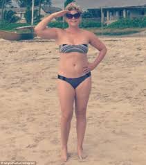Amy schumer has confused the internet with some damning comments about celebrity pals emma stone, emily blunt and john krasinski. Amy Schumer Celebrates Independence Day In Her Bikini For Instagram Snap Daily Mail Online