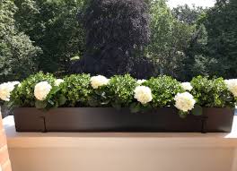 Increased curb appeal, year round colour and greenery to name just a few. London Planters Terrace Planters Garden Design And Landscaping London Planters And Window Boxes