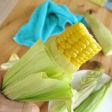 Cook with the husk on and then when complete, make a circular cut around the cob at the base. Microwave Corn On The Cob In Husk No Messy Silk The Dinner Mom