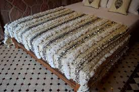 Each blanket is handmade, one of a kind, woven with ivory wool and white cotton and artistically embellished with silver sequins. Impressive Vintage Moroccan Wedding Blanket Embellished Sequins