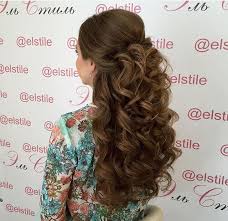 This hairstyle is a twist on a classic half up half down style that is both polished and whimsical. Big Curls Half Up Half Down Wedding Hairstyles Quince Hairstyles Pageant Hair Long Hair Styles