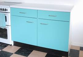 Some bathroom and kitchen cabinets are covered with melamine coating, a type of plastic that can separate from the underlying surface over time. Diy Video How To Spray Paint Melamine Kitchen Cabinets