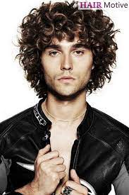 The curls give the quiff extra volume, . 45 Amazing Hairstyles For Men With Curly Hair Medium Curly Hair Styles Curly Hair Styles Curly Hair Men