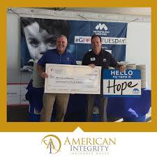 A financial services company that sees the world as you see it. Paul Roberts The Coordinator Of American Integrity S Annual Metropolitan Ministries Food Drive Presents The Organizatio American Group Insurance Metropolitan