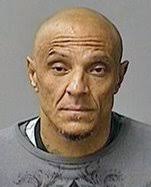 Stolen handgun seized from shoplifting suspect