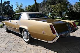 Image result for Medium Gold 1969 Cadillac