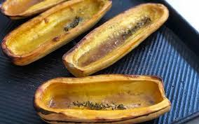Using a nice sharp knife, cut the squash in half. Roasted Delicata Squash With Maple Syrup