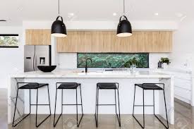 Check spelling or type a new query. Large Luxury Australian Kitchen With Marble Island Bench Stock Photo Picture And Royalty Free Image Image 76913305