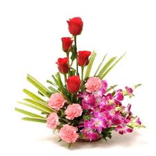 Basket Of Orchids Pink Carnation And Red Roses Online Flower Delivery Flower Delivery Flower Arrangements
