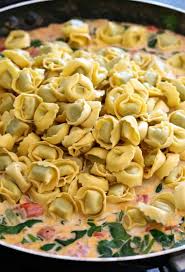Although all the aisles at trader joe's are filled with a zillion great choices, their frozen aisles are especially abundant. Skillet Tuscan Spinach Tortellini Mantitlement