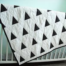Black And White Geometric Patterns For Babies Modern Geometric Baby Quilt In Black And White Triangles And Stripes For Boy Or Girl Reversible Whole Cloth Quilts Modern Baby Quilt Baby Quilts