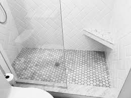 Potted greenery infuses a natural element to the space. Marble Subway Tile Bathrooms Layjao