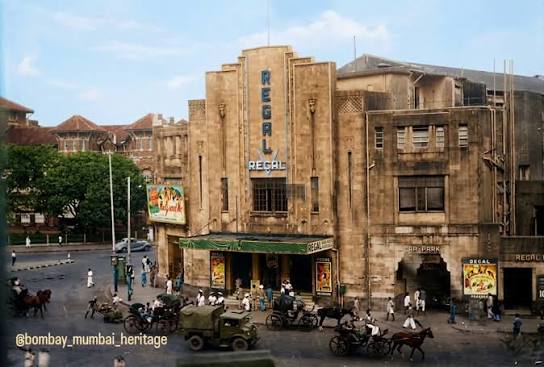 When Regal Cinema first opened its Art Deco doors in 1933, it was Bombay's very first air-conditioned theatre — all velvet seats and cinematic grandeur. Image 1: Back then, Colaba's streets were
