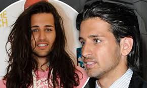 Ollie Locke chops off his glossy long tresses into short, slick style