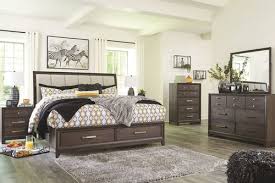 Save on these additional pieces. Ashley Brueban Rich Brown 7 Pc Dresser Mirror King Panel Bed With Storage 2 Nightstands Sold At Elite Furniture Proudly Serving Wichita Falls Tx And Lawton Ok