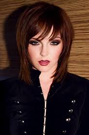 Here, a deep side part gives a bit more structure to an otherwise mussy cut. Shaggy Haircuts For Black Hair Novocom Top