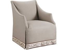 However, when turned to view the back one notices the stunning craftsmanship of a parallel row of nailhead trim neatly echoing the shape. Tight Seat Waterfall Skirt Tape Trim At Base Of Skirt Chair Marge Carson Furniture Design