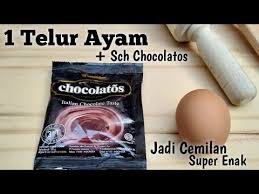 Tuang pada adonan yang telah diolesi margarin. Brownis Lumer Chocolatos Tanpa Mixer