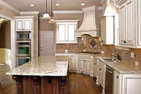 Yes, a white kitchen can be cozy: Giallo Rio Kitchen Granite Antique White Kitchen Antique Kitchen Cabinets Modern Kitchen Cabinet Design