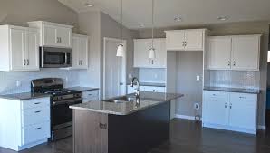 Aristokraft Benton Birch White Kitchen With Flagstone Island Counter Top Granite Color Car Aristokraft Cabinets Kitchen Cabinet Design Modern Farmhouse Decor