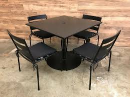 Skytop set of 2 black metal frame swivel dining chair (s) with gray sling seat. Heavy Duty Black Metal Outdoor Furniture Set Square Table W 4 Chairs Restaurant Equipment Charlotte Gastonia Nc Your Equipment Guys