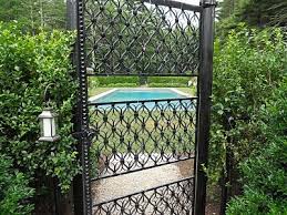See more of paradise landscape on facebook. Black Chain Link Fence Disguised By Shrubbery Coupled W Nice Wrought Iron Gates Wonder How Much Som Black Chain Link Fence Fence Landscaping Backyard Fences