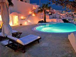 Fira Stefani At Night Vacation Getaways Beautiful Places Places To Go