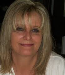 Is it normal for a 4-week-old bottle baby to avoid hay and goat feed?