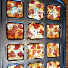 Mini Pizzas In The Pampered Chef Brownie Pan Http New Pamperedchef Com Pws Christinewyatt Pampered Chef Recipes Pampered Chef Brownie Pan Chef Recipes