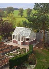 A greenhouse (also called a glasshouse, or, if with sufficient heating, a hothouse) is a structure with walls and roof made chiefly of transparent material, such as glass, in which plants requiring regulated climatic conditions are grown. A Guide To A Greenhouse Room In Your House Backyard Greenhouse Greenhouse Greenhouse Plans
