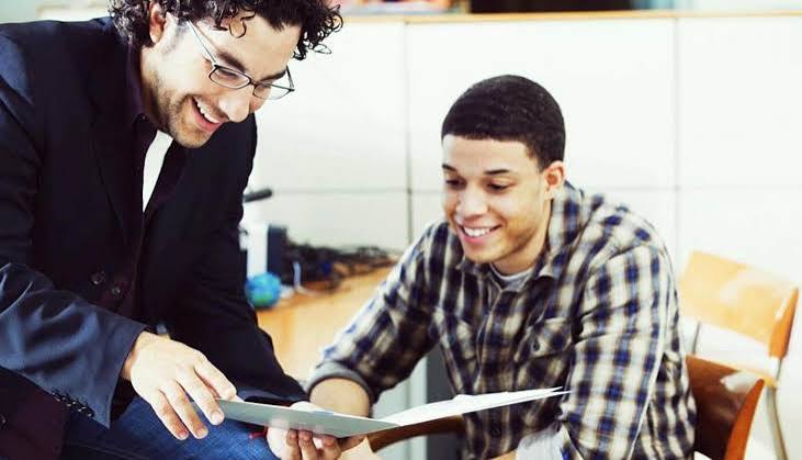 Mentor helping student