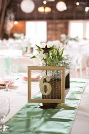 31 Non Traditional Wedding Table Numbers To Fall In Love With Unique Table Numbers Wedding Wedding Table Numbers Creative Wedding Table Numbers