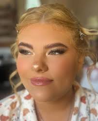 Who can recommend a makeup artist for a wedding?