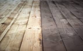 Before opening the can of paint or stain, apply painter's tape to adjacent parts of a house or garage. The Difference Between Deck Stain Vs Paint Tandem Contracting