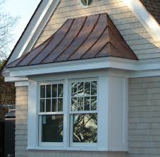 Is one of the largest and most reputable storm damage restoration companies in the country. Copper Standing Seam Roof Over Window Traditional Exterior Boston By Aspen Roofing Services Inc