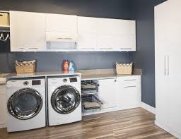 Get inspired with modern, laundry room ideas and photos for your home refresh or remodel. Modern Laundry Room Featuring Custom Cabinet For Laundry Room