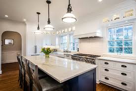 When i moved into my home 9 years ago, kitchen island pendant lights were much smaller. Demystifying Kitchen Island Lighting Corinthian Fine Homes