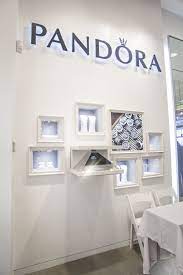 City Lighting Products Worked Together With Pandora To Accurately Execute Dramatic And Captivating Lighting To Help The Store Pandora Design Pos Display Design