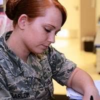 Staff Sgt. Haley Barlow re-files medical records at