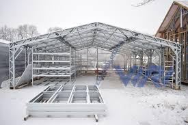 Carports offer various advantages to any homeowner including vehicle protection, adding shade to your property, and more. Light Steel Frame Greenhouse A Green House Is Typically A Glass Building In Which Plant Steel Structure Buildings Steel Frame Construction Metal Building Homes