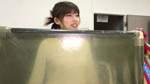 BoundHub - Japanese woman in vacuum cube