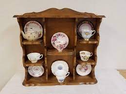 Modernize an old curio cabinet with paint. Lot 58 Solid Maple Teacup Curio Cabinet 2 Teacup Saucer Sets Single Cups Saucers England Teapot Puget Sound Estate Auctions