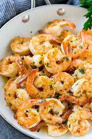 Shrimp In A Skillet That Are Seared In Garlic Butter And Sprinkled With Parsley Shrimp Recipes Easy Buttered Shrimp Recipe Easy Shrimp Dinner